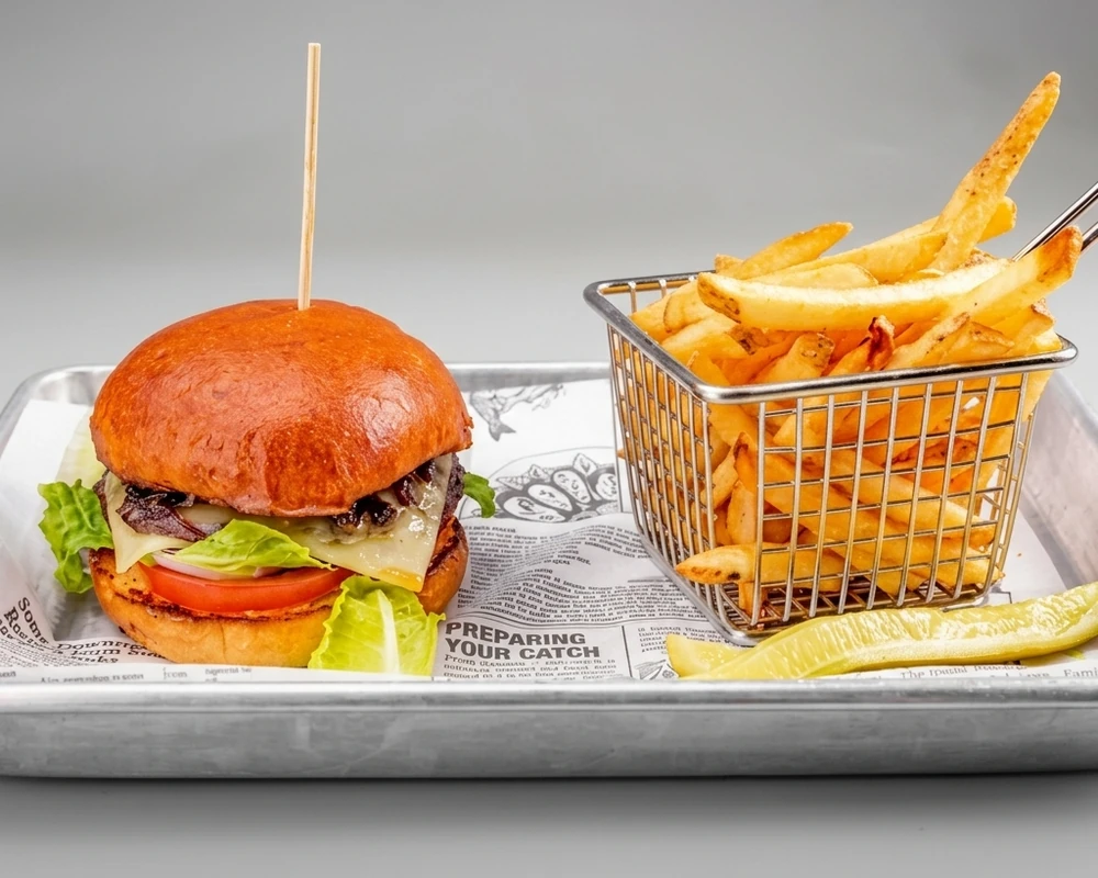Wagyu cheese burger with smoked cheddar and fries at Binge Pizza, Calgary